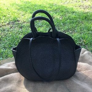 Round Black wicker tote. NWT 15x15